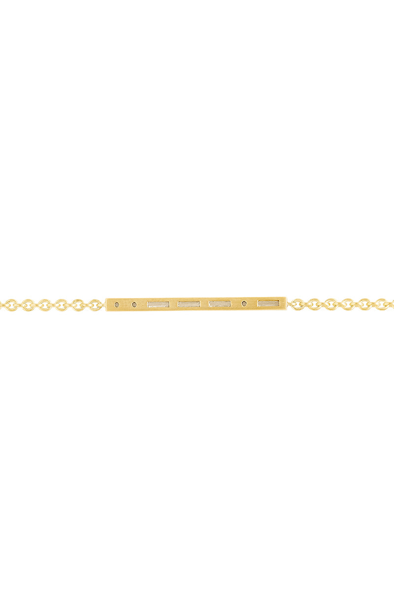 Close-up of EDXÚ Morse Bridge Necklace in matte gold with diamond details, showing the intricate design and fine craftsmanship.