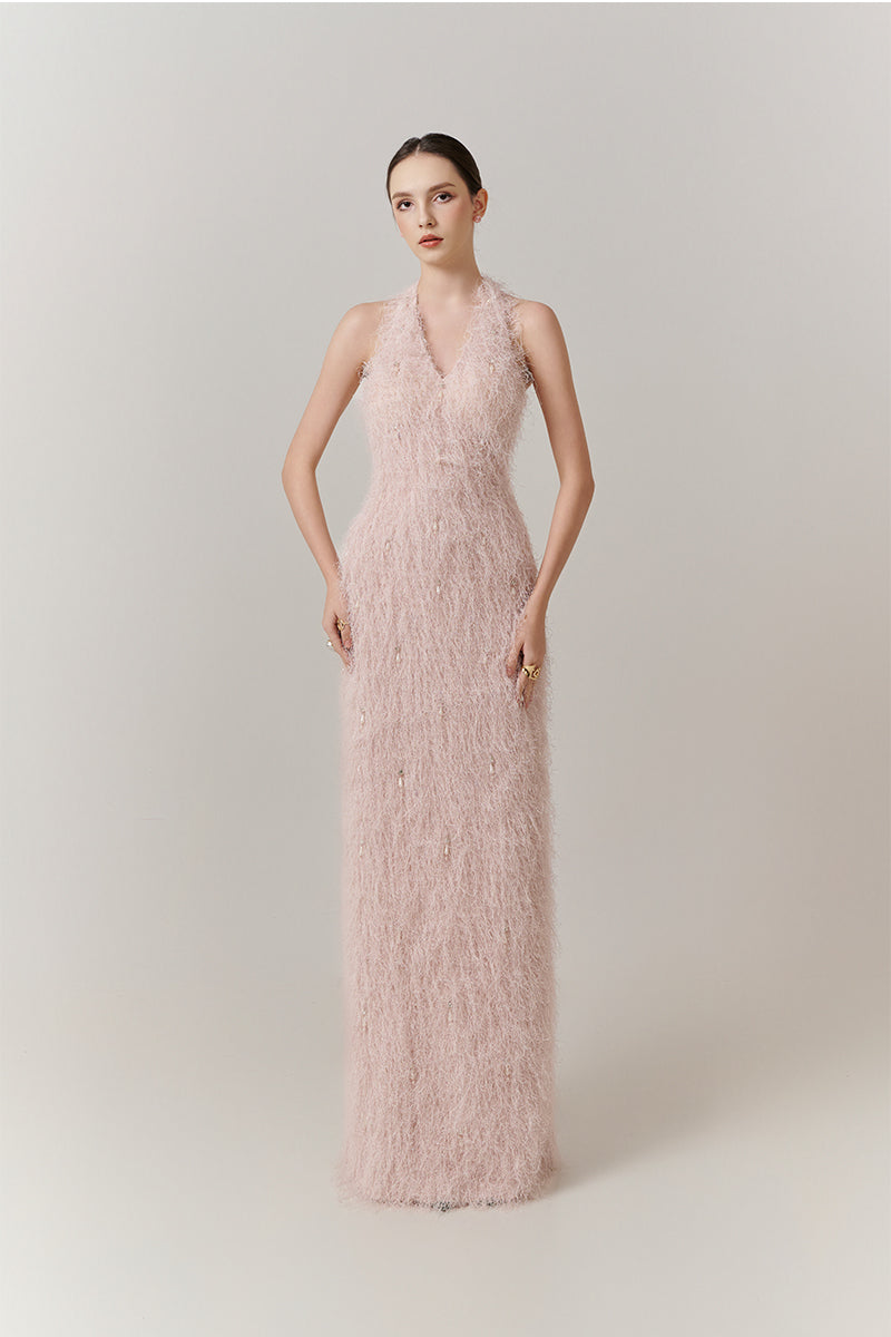 Elegant V-neck feather polyester gown by Happy Clothing featuring a floor-length design and flowing silhouette.