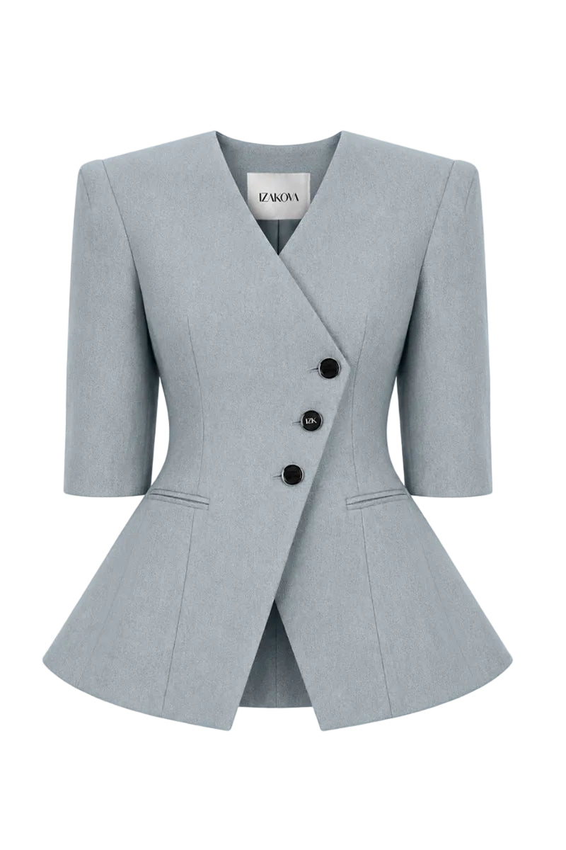 Izakova NELA washed blue blazer displayed on a hanger, featuring a tailored fit and classic lapel design.