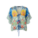 niLuu Carmen tie top in ghost color, featuring a stylish tie detail and lightweight fabric, perfect for casual or dressy occasions.