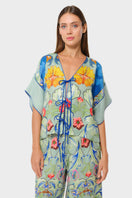 niLuu Carmen Tie Top, stylish women's blouse with tie-front detail, lightweight fabric, and short sleeves.