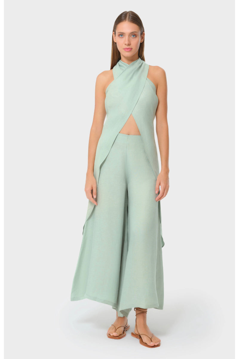niLuu Jade Liz Cross Halter Top, stylish sleeveless top with a crisscross halter neckline, perfect for summer fashion.