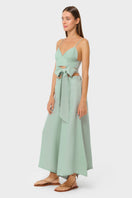 NiLuu Jade Palazzo Pants featuring a flowy, wide-leg design in a vibrant jade green fabric.