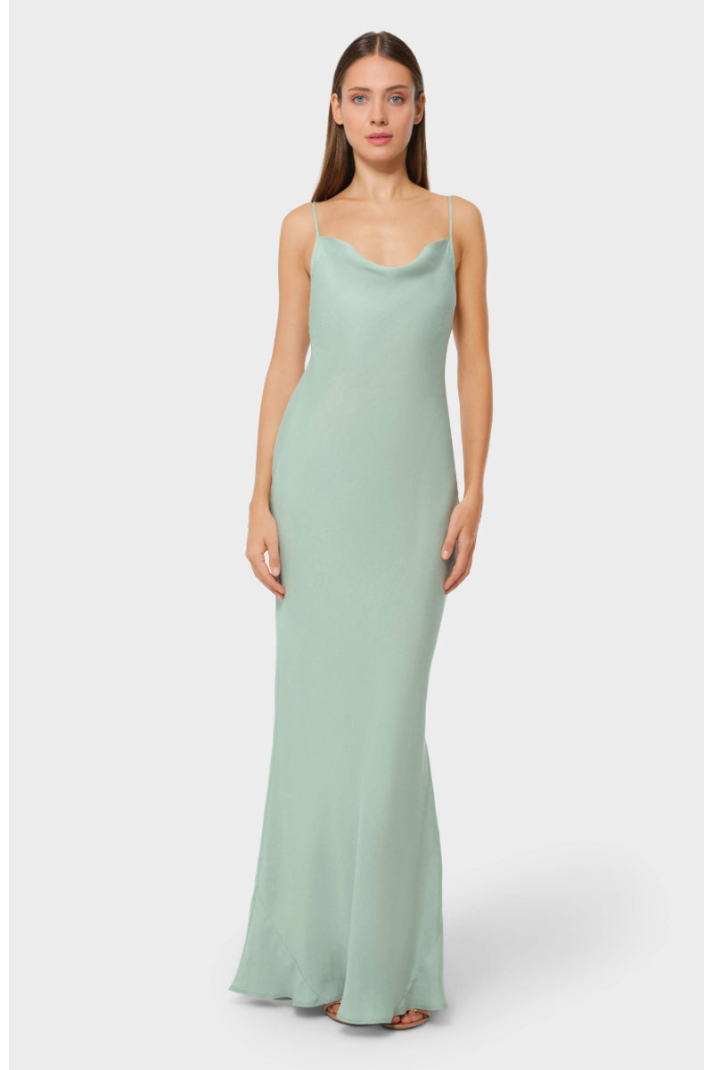 NiLuu Jade Scarlet slip dress, a stylish maxi dress with a flowing silhouette and vibrant red color, perfect for elegant occasions.