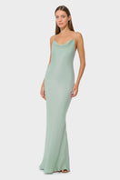 NiLuu Jade Scarlet slip dress, a stylish maxi dress with a flowing silhouette and vibrant red color, ideal for elegant occasions.
