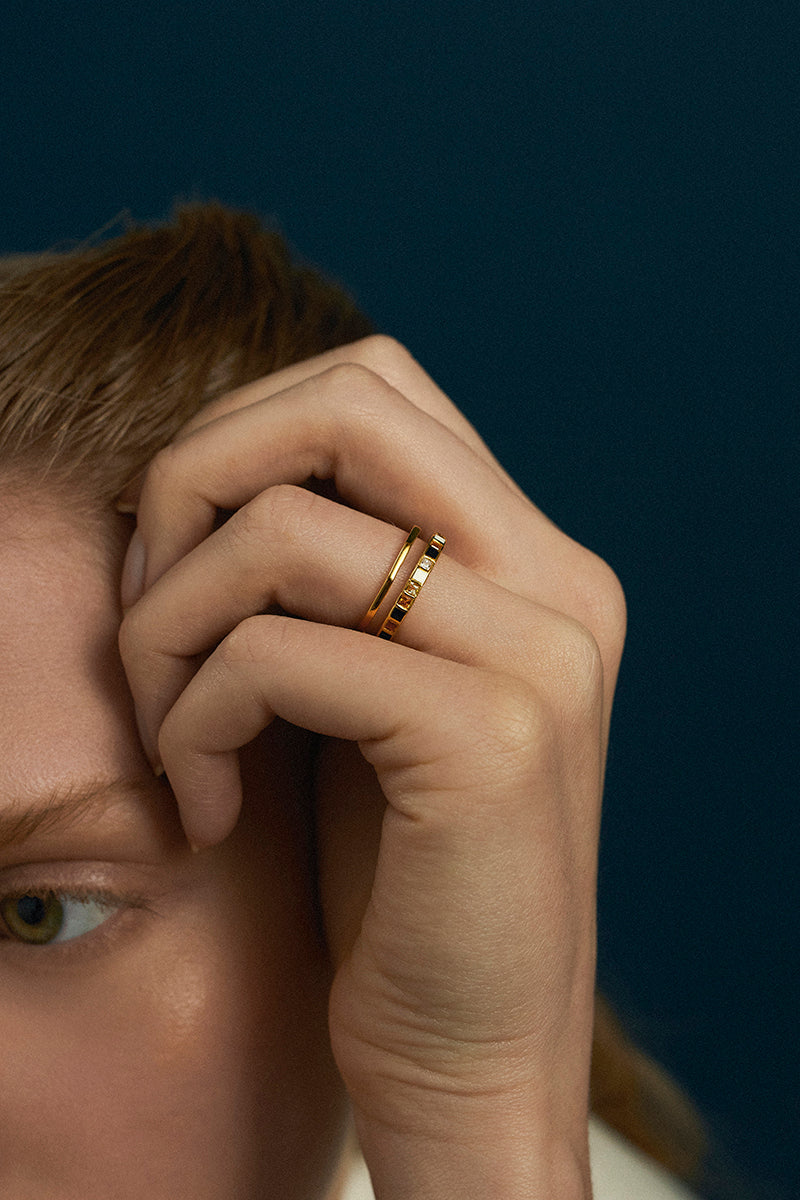 Gold plated silver Nova ring with enamel and gemstone accents, stylish jewelry piece by EDXÚ.