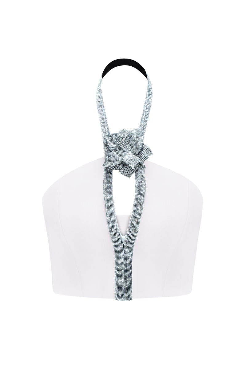 Nué Cult Mia X Nué Studio rose corset top in white, featuring structured design and adjustable straps.