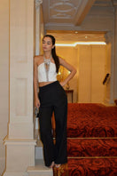 White Cult Mia X Nué Studio rose corset top, featuring structured design and adjustable straps, displayed on a mannequin.