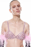 Pink rose quartz embellished bra by Nué, featuring intricate beadwork and delicate design, worn as a stylish top.
