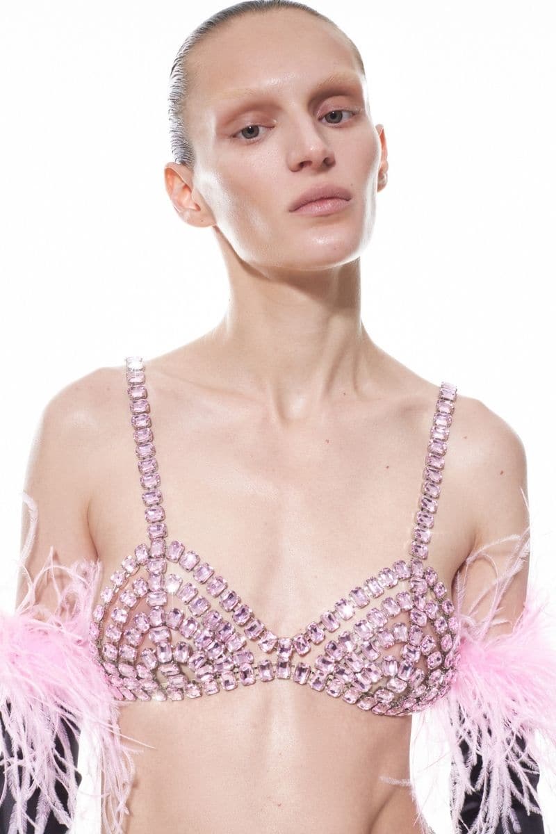 Pink rose quartz embellished bra by Nué, featuring intricate beadwork and delicate design, worn as a stylish top.