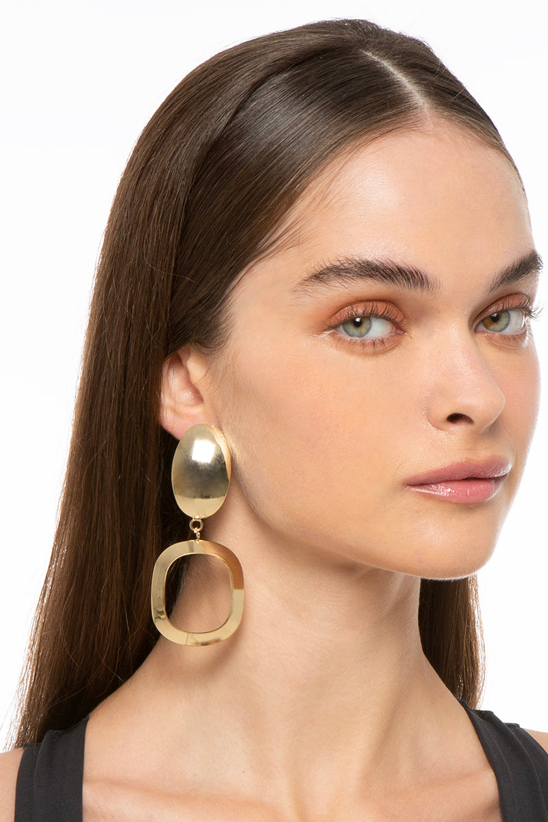 Silver and gold earrings named Hazel by Silvia Gnecchi, featuring a stylish and elegant design.