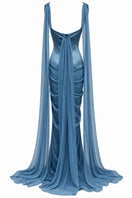 Blue ORELIS gown by URBAN MUSE featuring elegant fabric and a flowing silhouette, perfect for stylish occasions.
