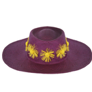 Purple Dia de Sol hat by Pájara Pinta featuring a wide brim and woven design, perfect for sunny days.