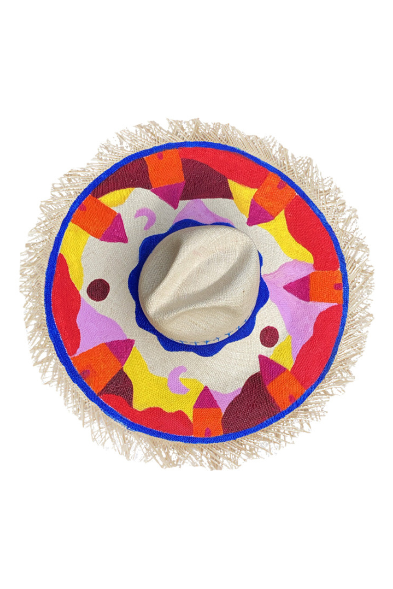 Multi-colored Encanto print hat by Pájara Pinta featuring vibrant patterns and a wide brim, designed for stylish sun protection.