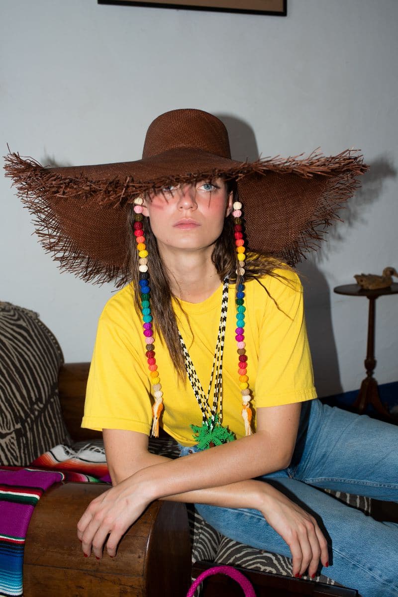 Pájara Pinta Holiday Iraca Palm Sun Hat in chocolate color, stylish wide-brim hat perfect for sunny outdoor wear.
