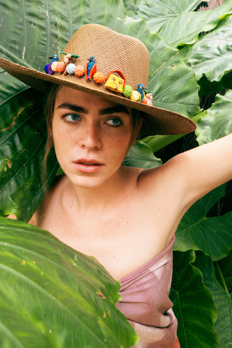 Beige Pajarito hat by Pájara Pinta, stylish wide-brim hat made of lightweight material, one size fits most.