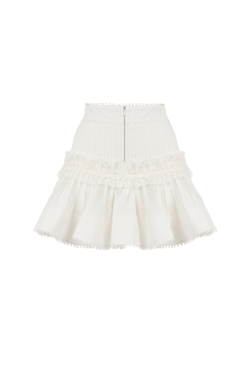 AISA pearl mini skirt with a sleek design featuring pearl embellishments on soft fabric, perfect for stylish casual wear.