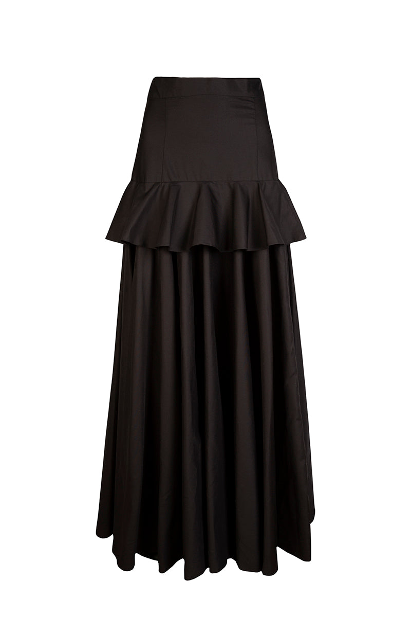 Nara Niro peplum maxi skirt in flowing fabric, featuring a fitted waist and flared hem, perfect for elegant summer outfits.