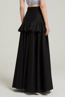 Black peplum maxi skirt by Nara Niro, featuring a flowy silhouette and stylish peplum detail for elegant, everyday wear.