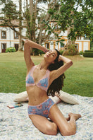 Pink and blue lingerie set featuring a bralette and boyshorts from Luciela's Poppy collection, displayed on a white background.