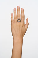 Poché Crystal Harmony Ring featuring a sparkling crystal stone set in a sleek silver band, elegant jewelry for any occasion.