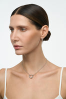 Silver Flow Necklace by Poché featuring a sleek, modern design with smooth, flowing lines and a polished finish.