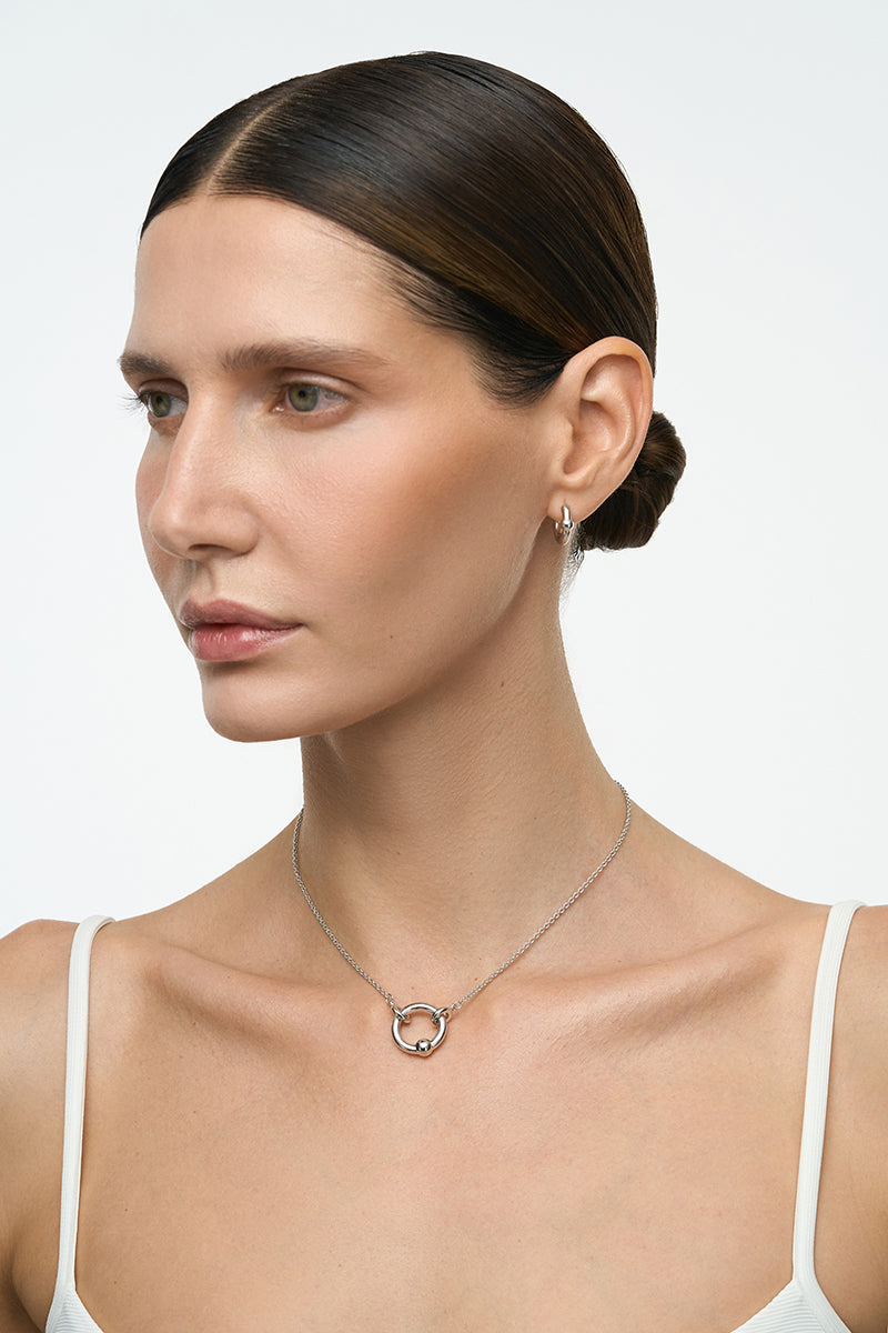 Silver Flow Necklace by Poché featuring a sleek, modern design with smooth, flowing lines and a polished finish.