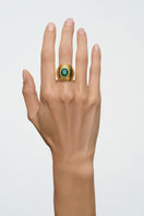Gold candy ring by Poché, stylish jewelry piece featuring a playful candy design in shiny gold metal.