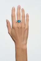 Silver Thorn Ring by Poché, featuring a detailed thorn design, showcased on a neutral background.