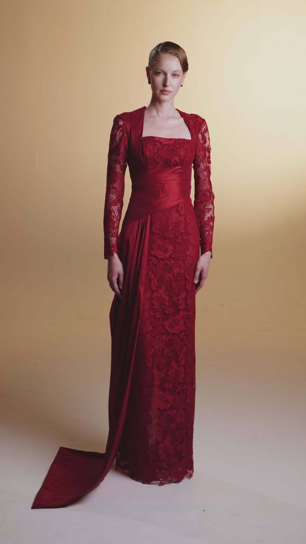 RED TRAPEZE NECK COLUMN GOWN IN DARK GUIPURE LACE AND TAFFETA