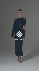 ASYMMETRICAL COLUMN DRESS WITH DRAPED CAPE SLEEVE IN BLUE