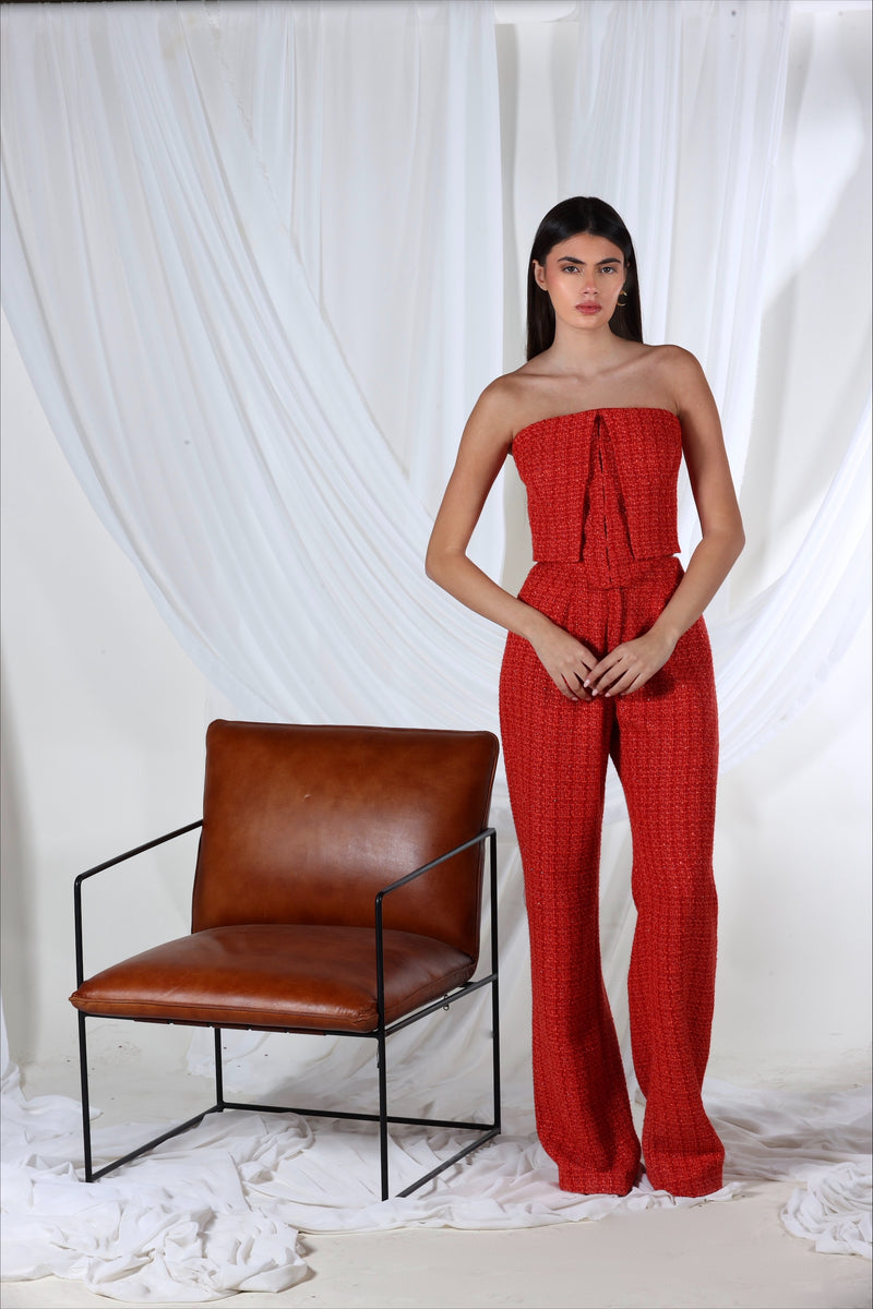 Aquarel Studio red corset top with structured design and lace-up front, styled as a fashionable women's top.