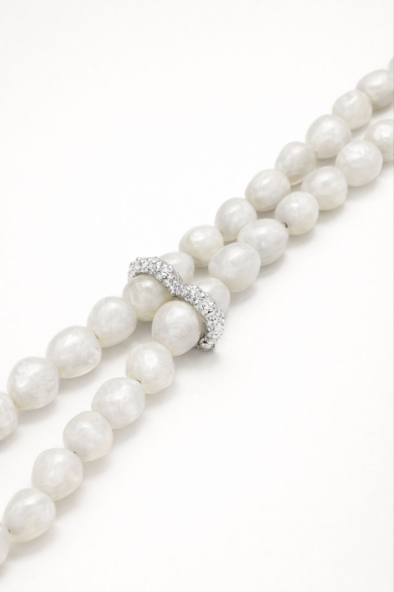 Jude Benhalim Cascade Necklace in white, featuring layered chain design, stylish jewelry accessory for women.