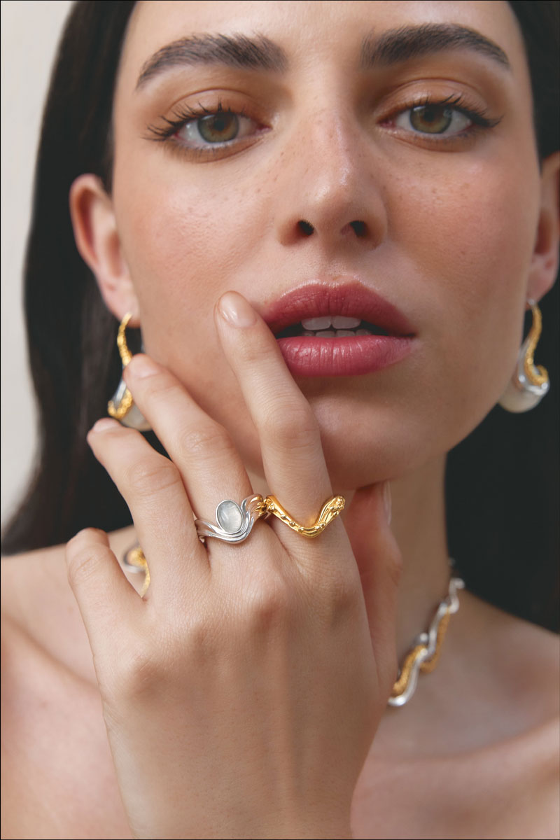 Elegant Jude Benhalim eternity ring with sparkling gemstones, showcasing a continuous circle of brilliance.
