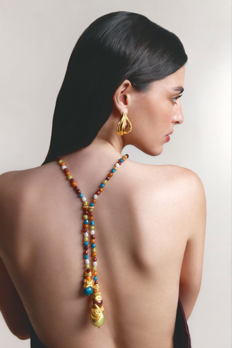 Brown Cascade Necklace by Jude Benhalim, featuring layered chain design, displayed on a neutral background.