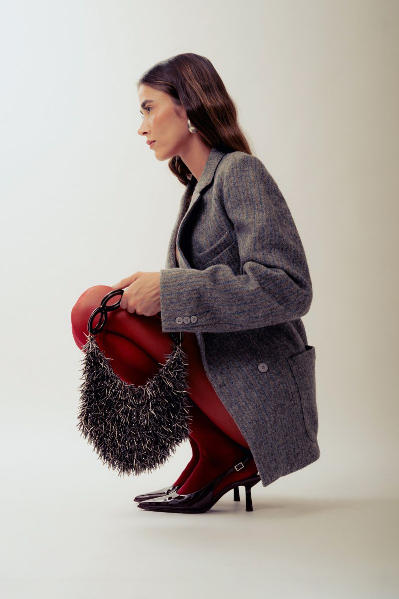Millanne Tale PUNKA silver top handle bag with metallic finish, stylish punk-inspired handbag with sturdy handle and gray color.