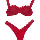 Señorita Sariera bikini with vibrant patterned fabric and classic bikini top and bottom, suitable for beach and swimwear.