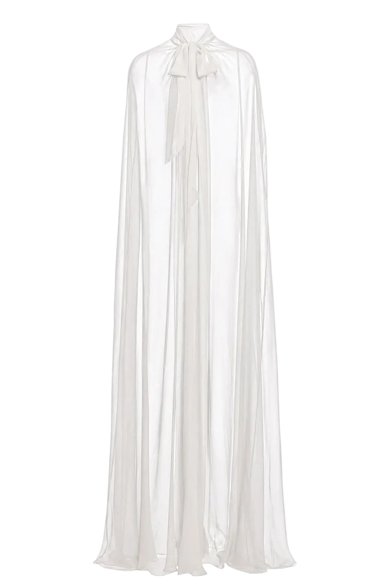White Reine Cape jacket by Gigii's, stylish outerwear with a flowing design and elegant fit, perfect for layered winter looks.