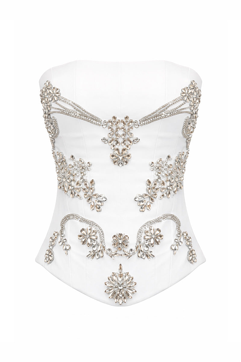 White Reine Corset top by Gigii's, featuring structured design and lace-up details, displayed on a mannequin.