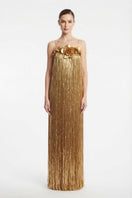 Alersundi Cult Mia X Alersundi Melissa gold gown with elegant design and flowing fabric, suitable for formal occasions.