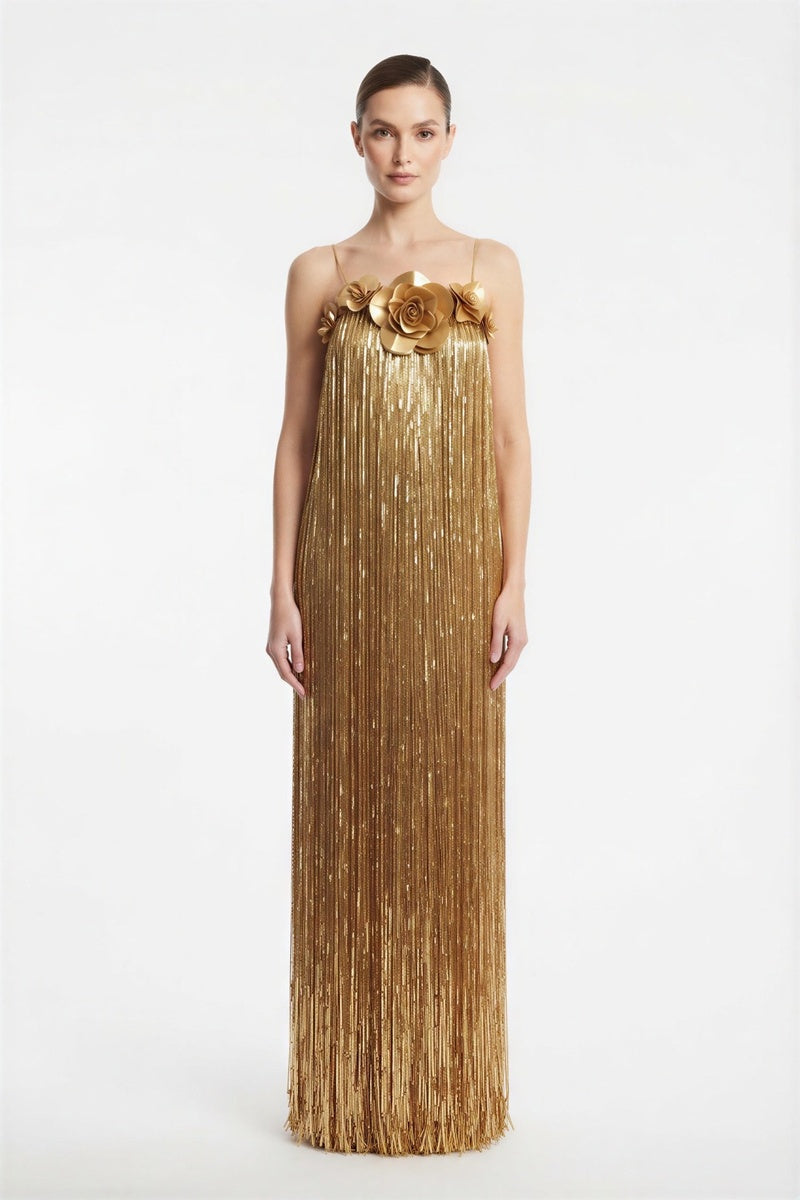Alersundi Cult Mia X Alersundi Melissa gold gown with elegant design and flowing fabric, suitable for formal occasions.