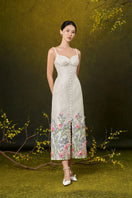 Rosee de Matin Ivy A-line strappy damask midi dress displayed on a model, showcasing elegant design and intricate damask pattern.