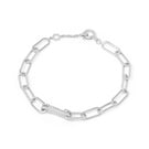 Silver XAVI bracelet by EDXÚ featuring rhodium finish and diamond chain design, showcasing elegant jewelry craftsmanship.