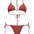 Pink orchid bikini in rosé by Laura Escobar, featuring a stylish bikini top and bottom with floral design and adjustable straps.