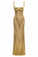 Elegant gold maxi gown by Urban Muse featuring flowing fabric and a stylish silhouette, perfect for formal occasions.