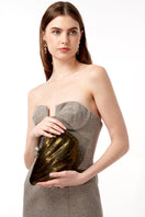 Black saline fan-shaped clutch by Emm Kuo with metallic finish, featuring a unique fan design and compact style.