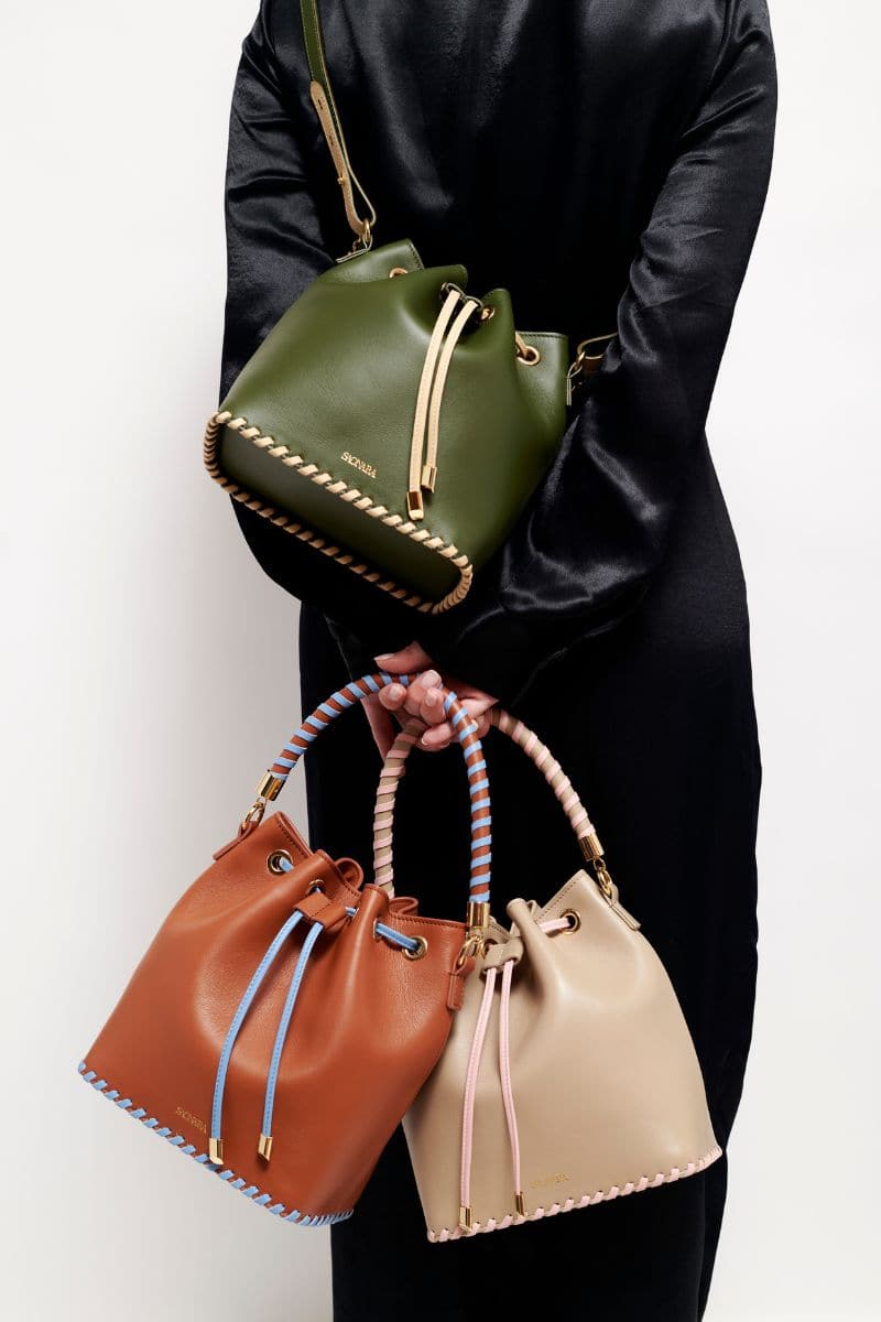 Taupe Peony bucket bag by Saonara, featuring a stylish top handle design and soft peony-colored leather.