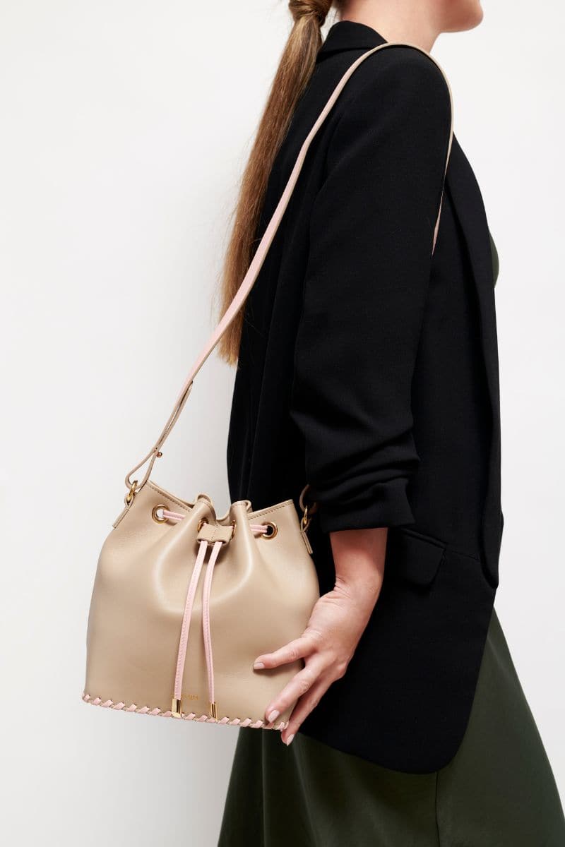 Taupe Peony bucket bag by Saonara, stylish top handle bag with a soft, rounded design and elegant texture.