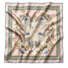 BY HAÓ Jardin de la Cour scarf featuring floral patterns and soft fabric, displayed flat showcasing vibrant colors and detailed design.
