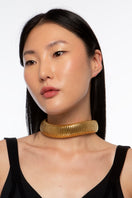 Silver serpent gold necklace by Silvia Gnecchi featuring a sleek, winding serpent design on a polished chain.